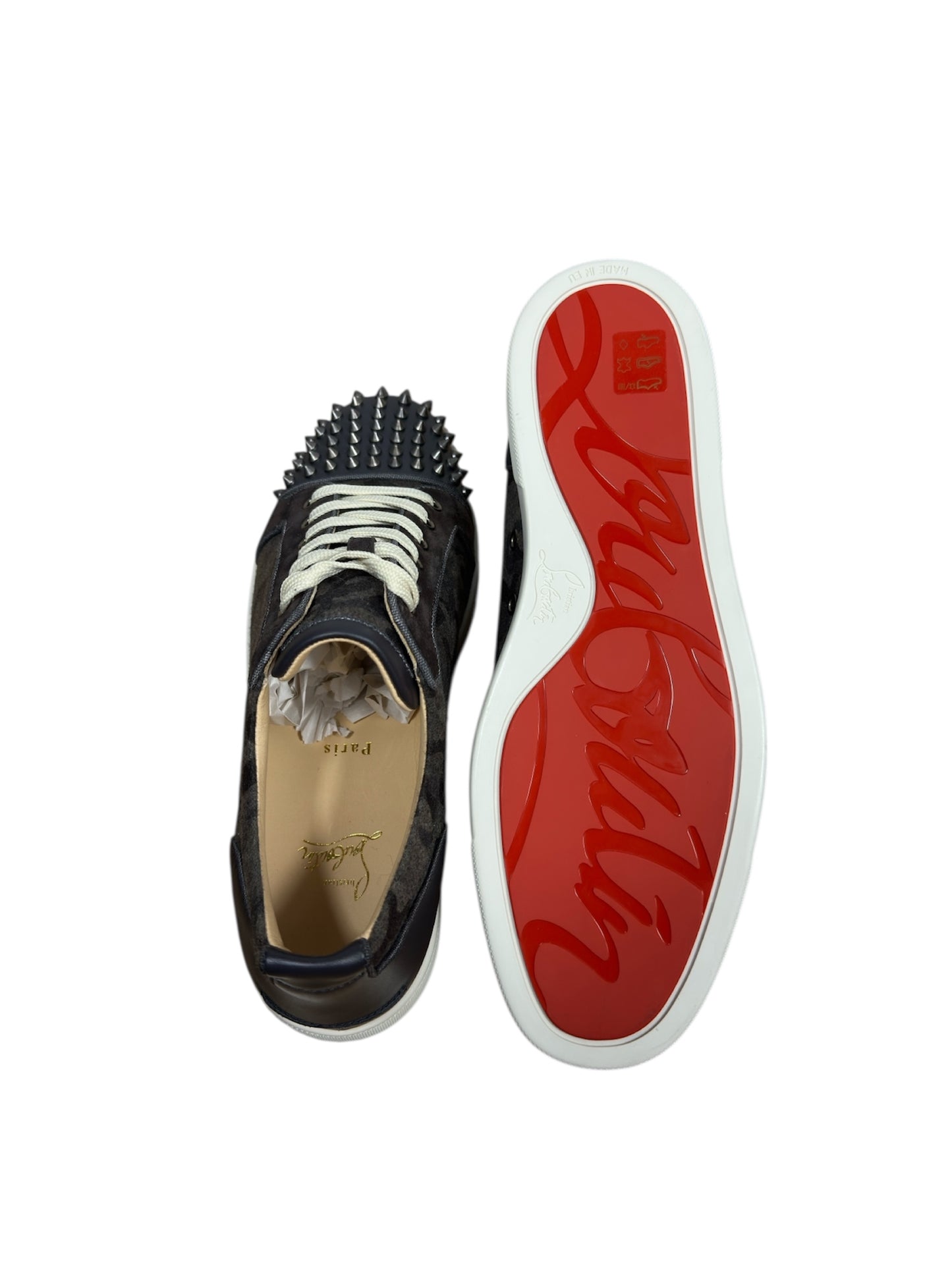 Christian Louboutin sneaker red sole bottom view — FashnLuxe
