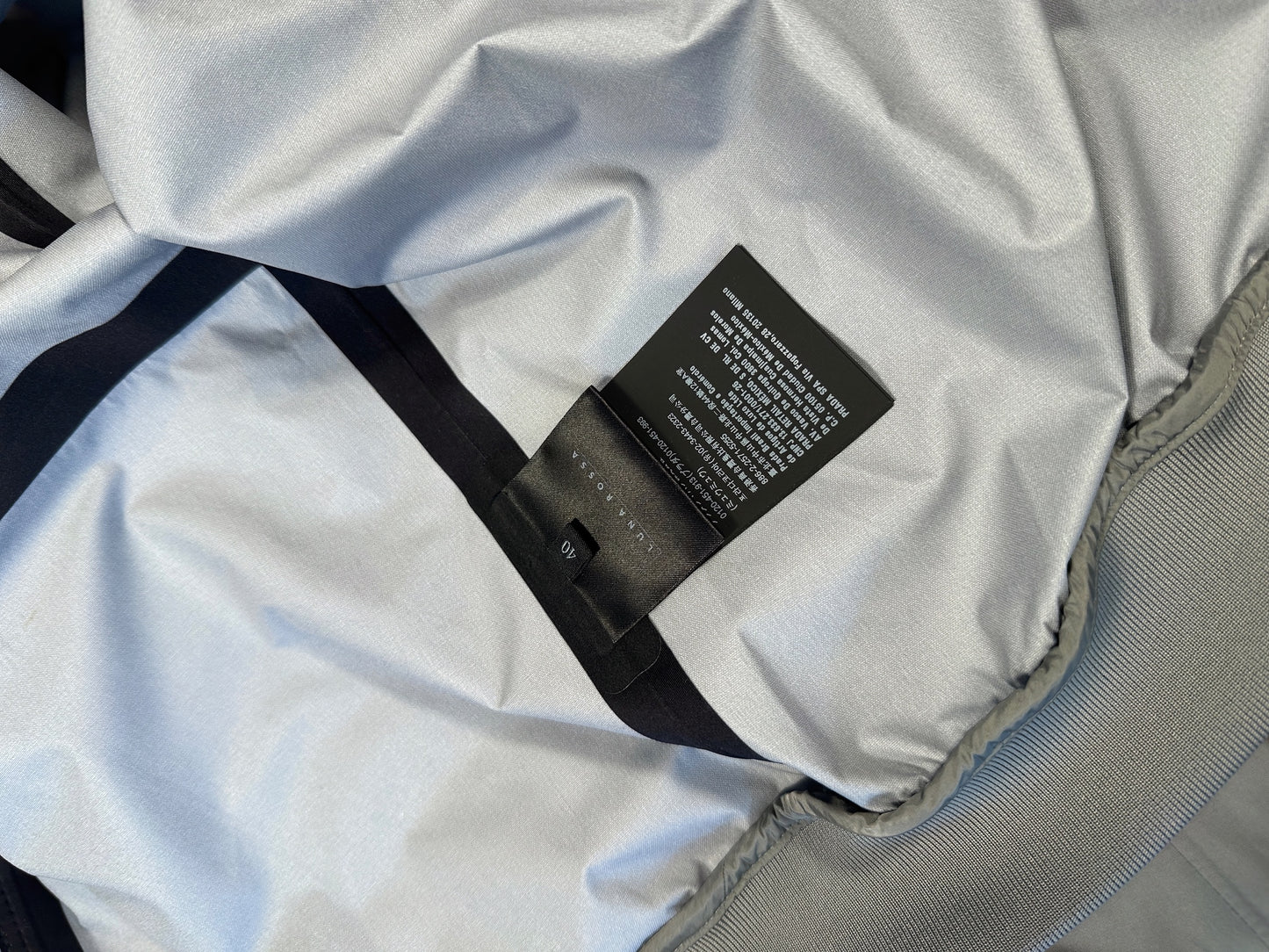Prada Luna Rossa care and size label showing size 40