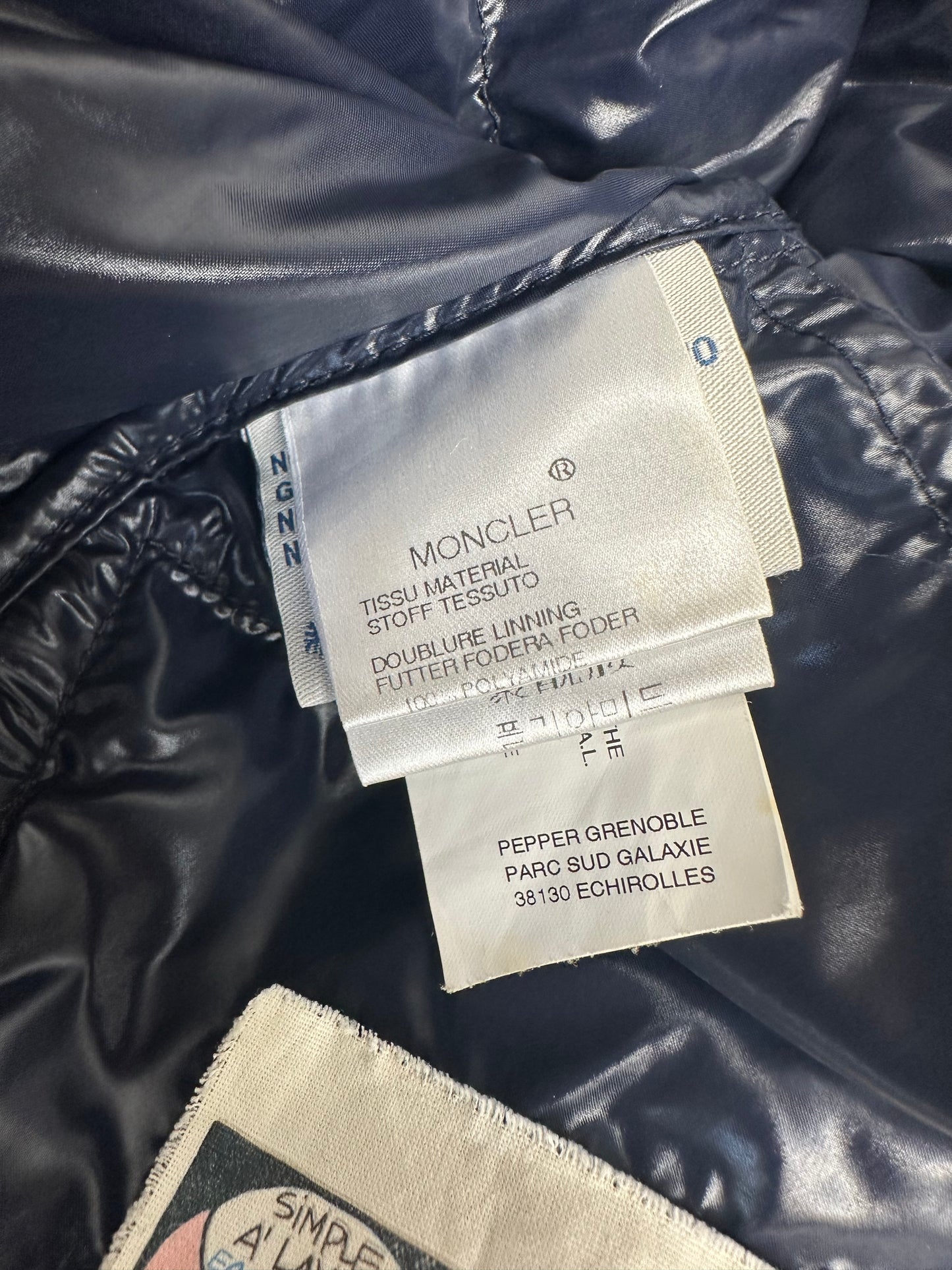 Moncler Grenoble jacket badge detail — FashnLuxe