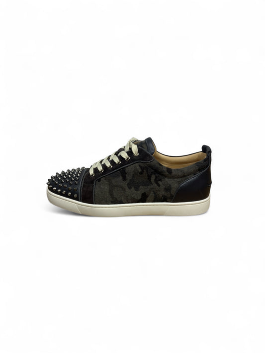 Christian Louboutin high-top leather sneaker side view — FashnLuxe