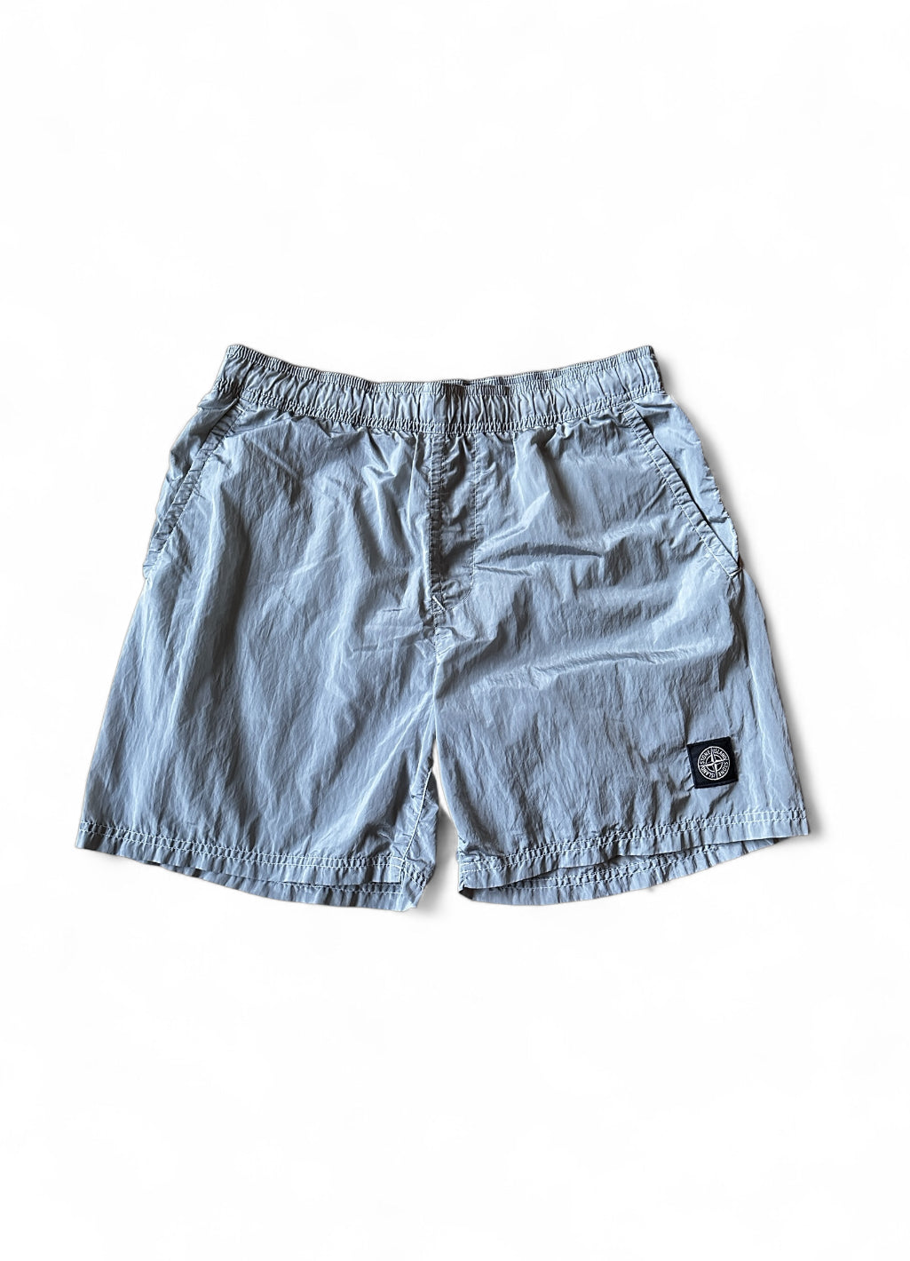 Stone Island swimshorts with compass patch side view — FashnLuxe