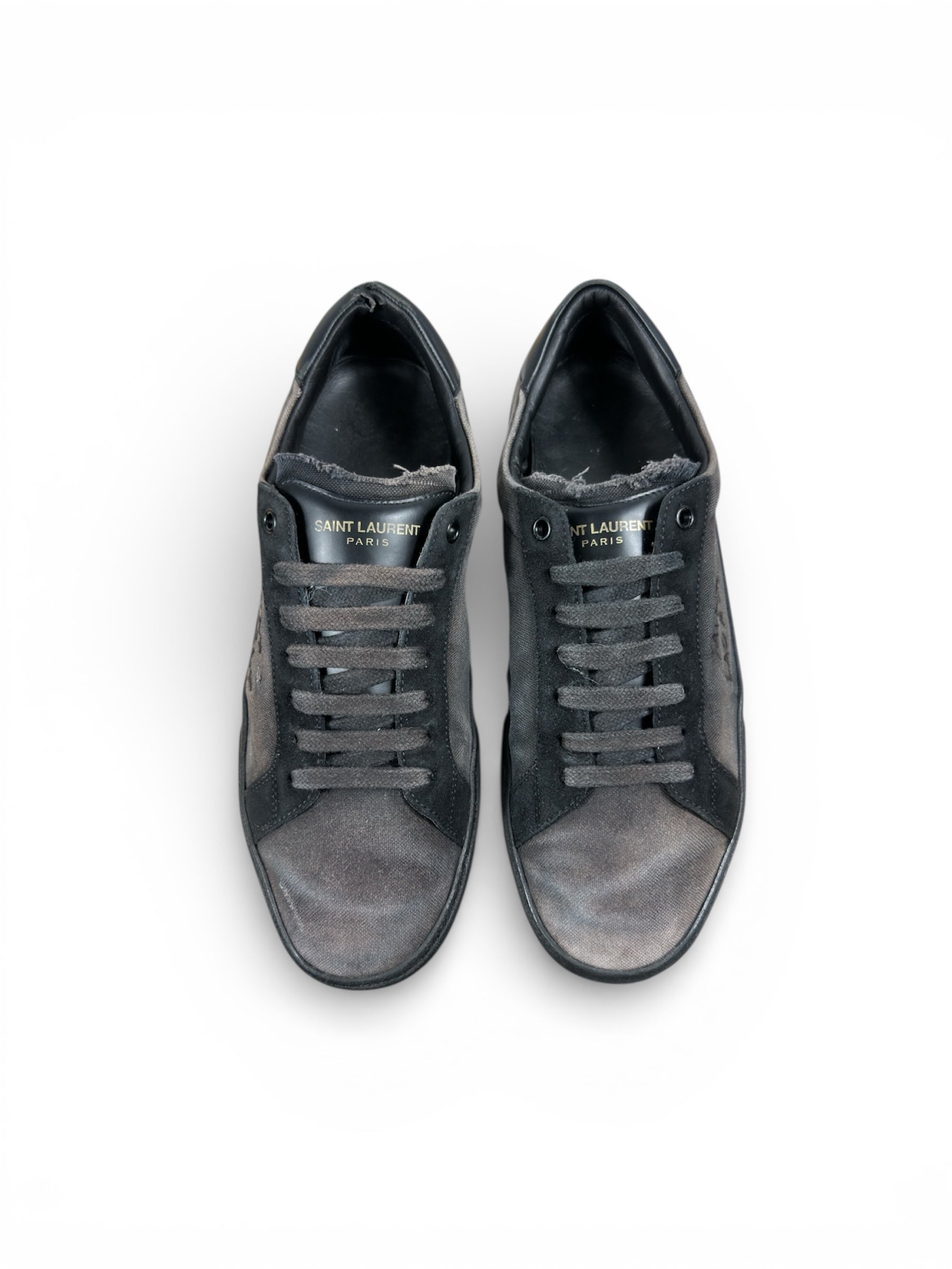 Saint Laurent 06 sneaker YSL tongue detail — FashnLuxe