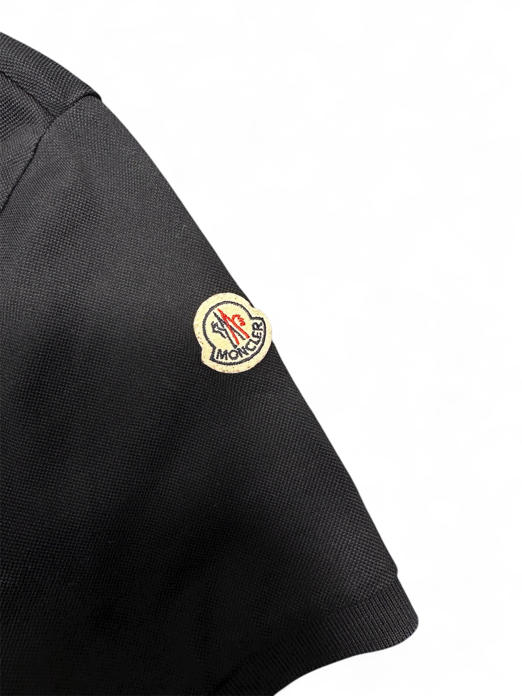 Moncler polo logo embroidery detail — FashnLuxe