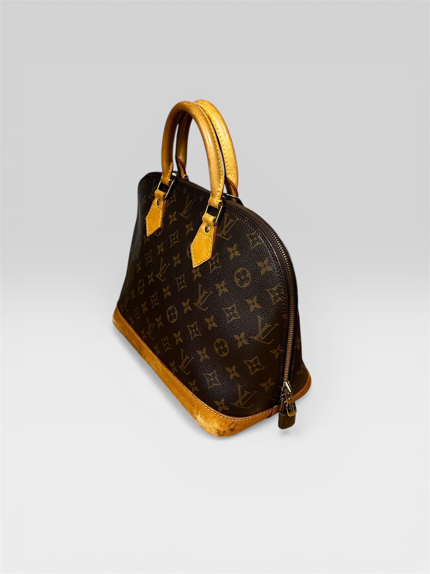 Louis Vuitton Alma PM vachetta leather handles — FashnLuxe