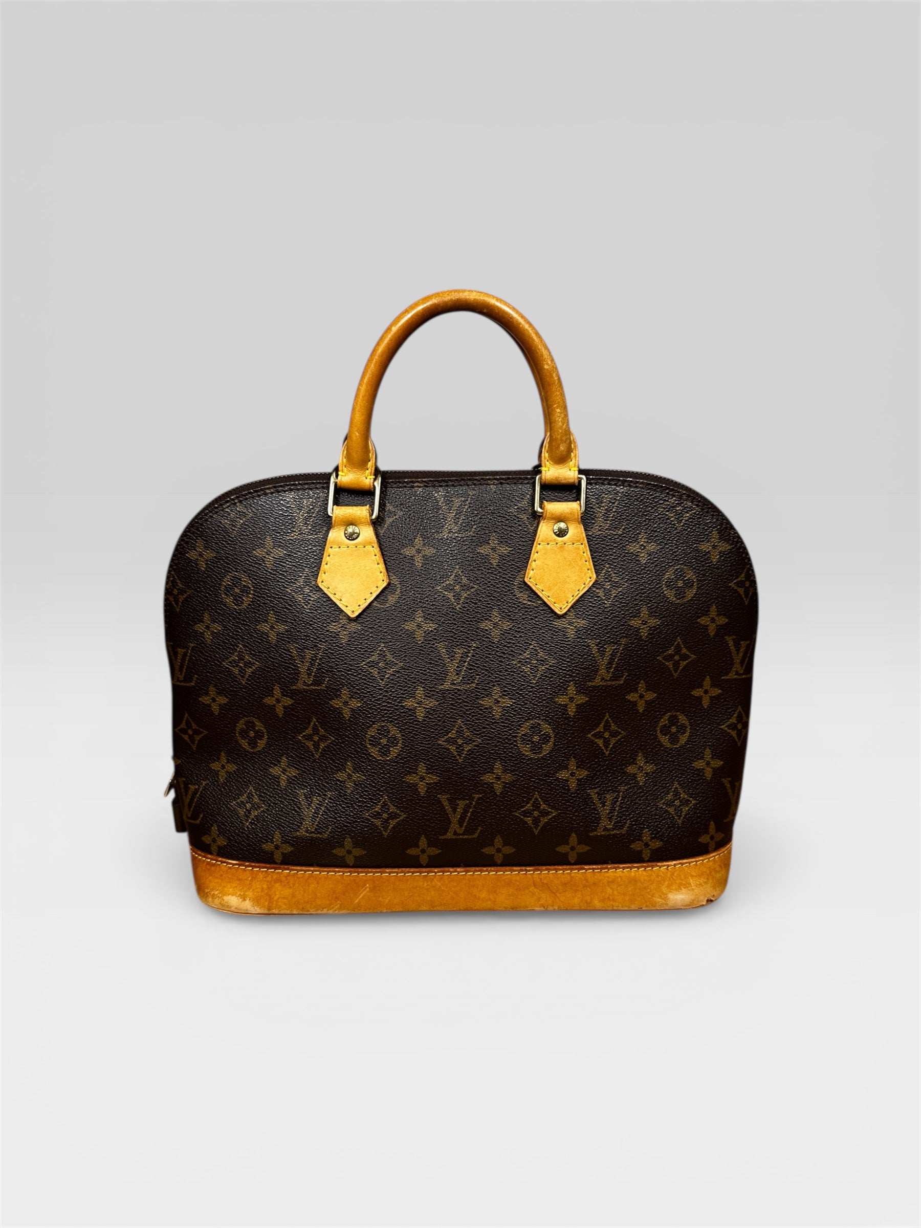 Louis Vuitton Alma PM double zip closure detail — FashnLuxe