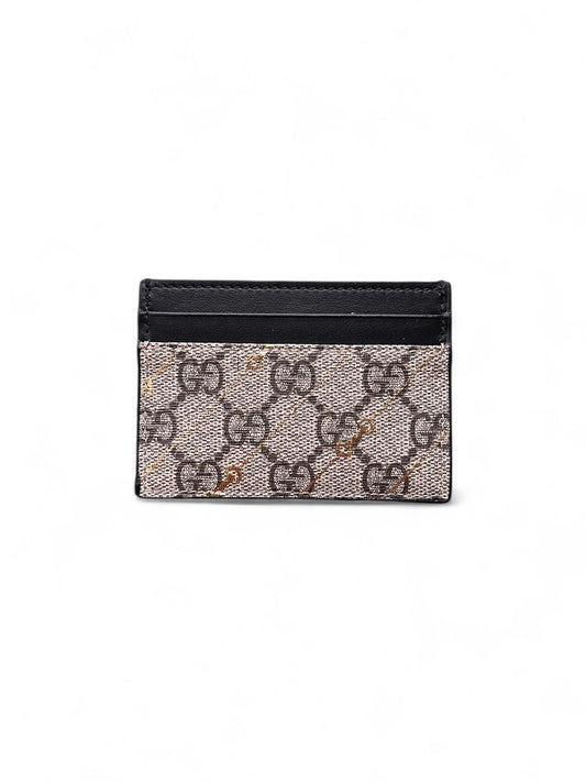 Gucci cardholder with gold GG hardware — FashnLuxe