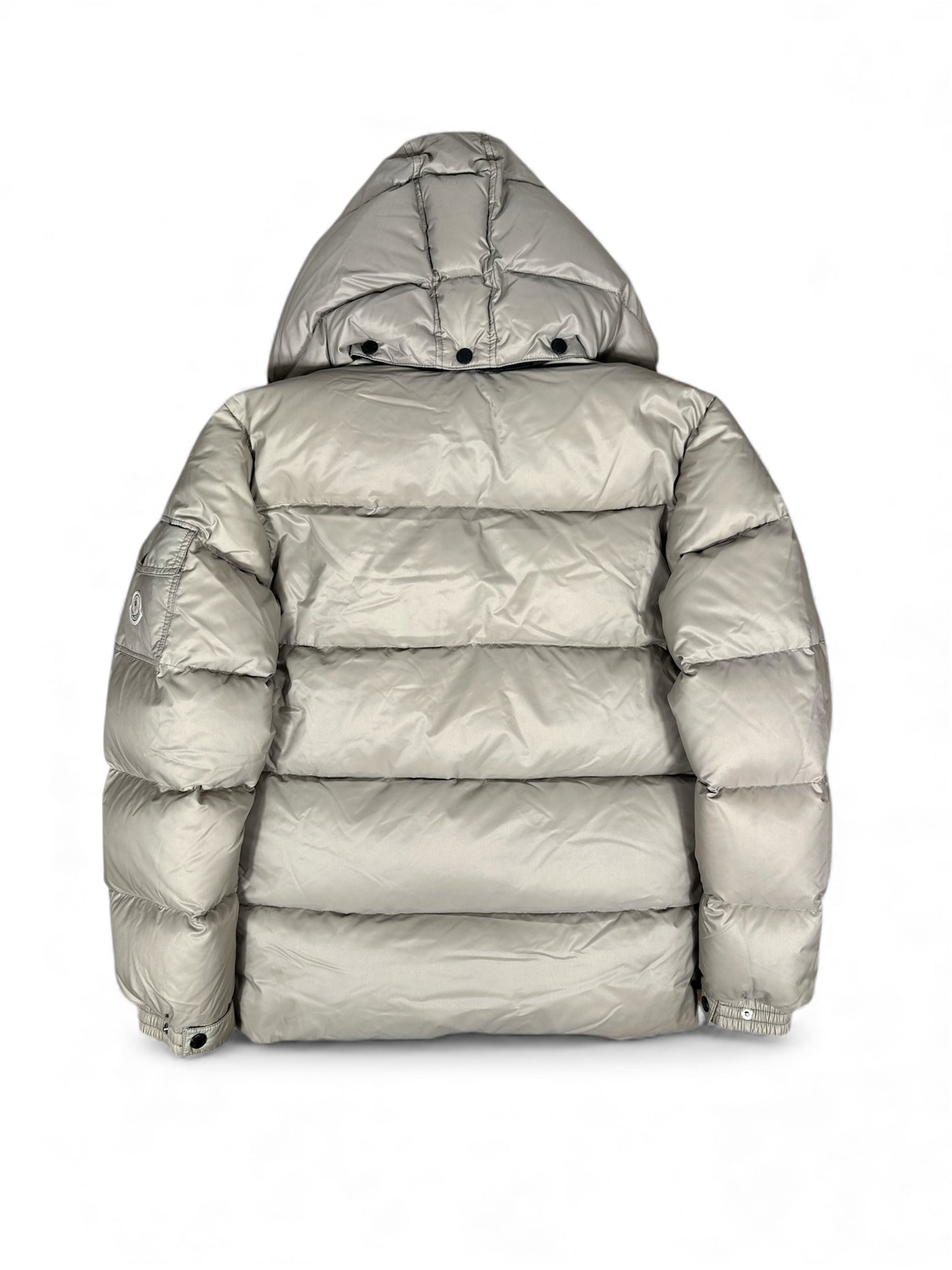 Moncler Himalaya jacket circular badge detail — FashnLuxe
