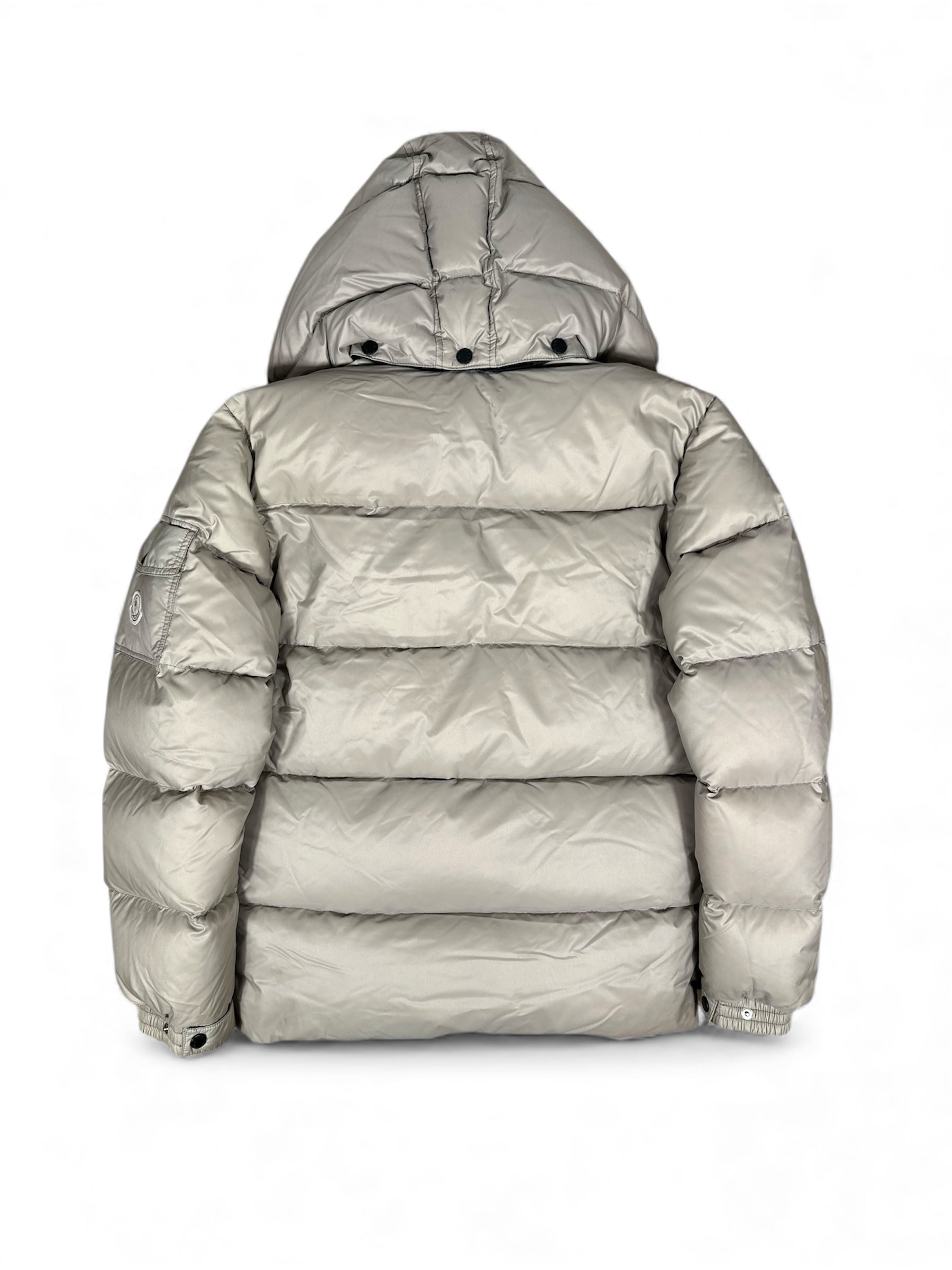 Moncler Himalaya jacket circular badge detail — FashnLuxe