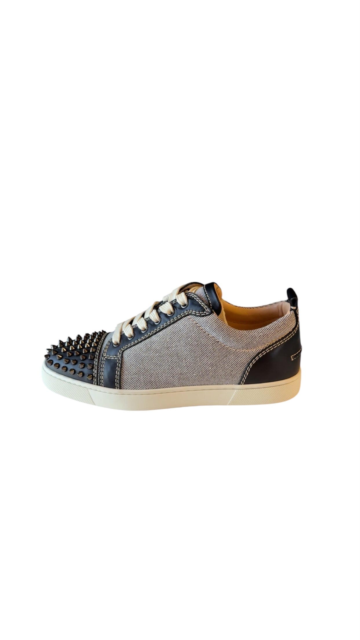 Christian Louboutin Junior Spikes luxury sneaker side view — FashnLuxe