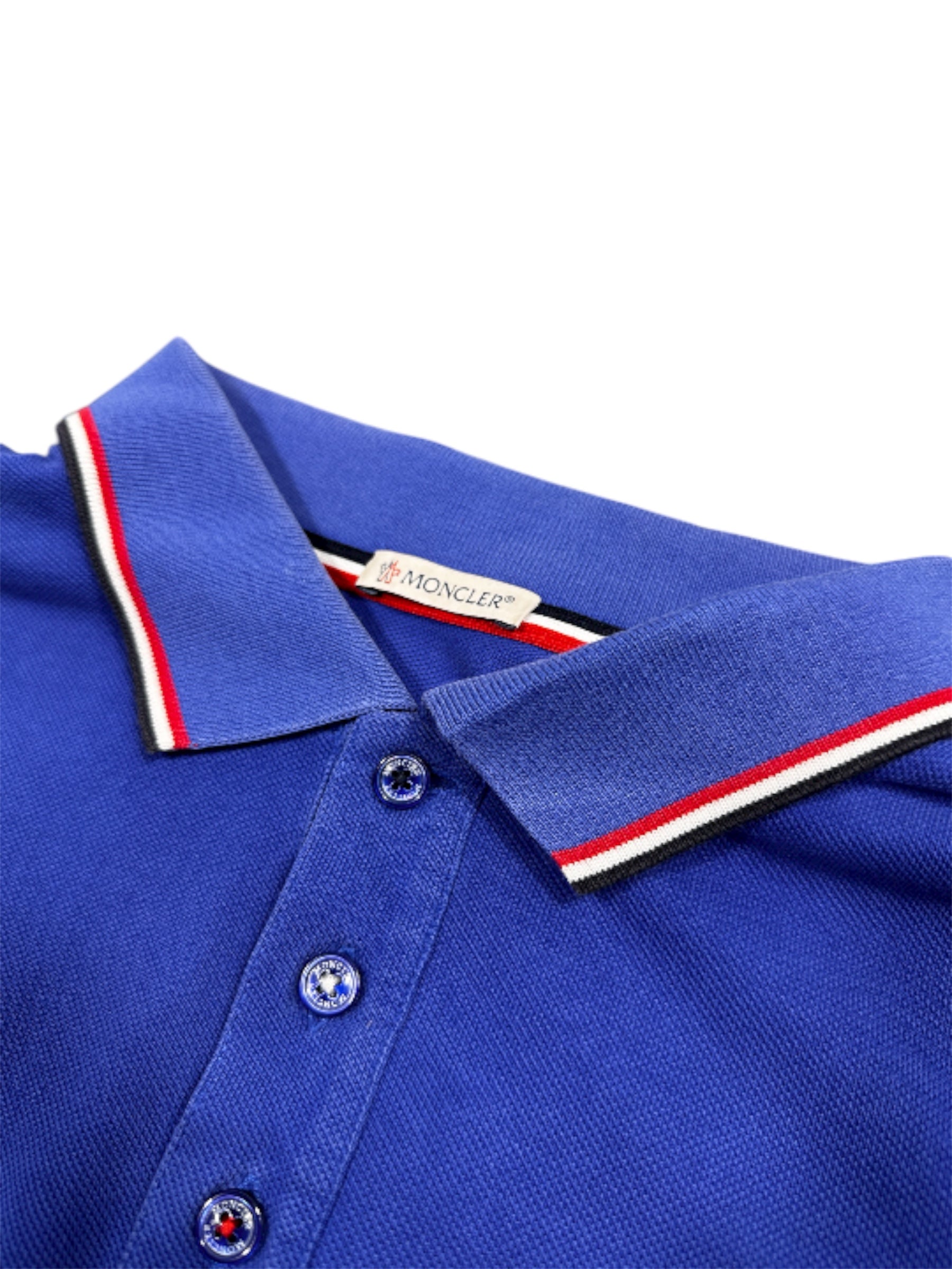 Moncler polo logo patch close-up — FashnLuxe