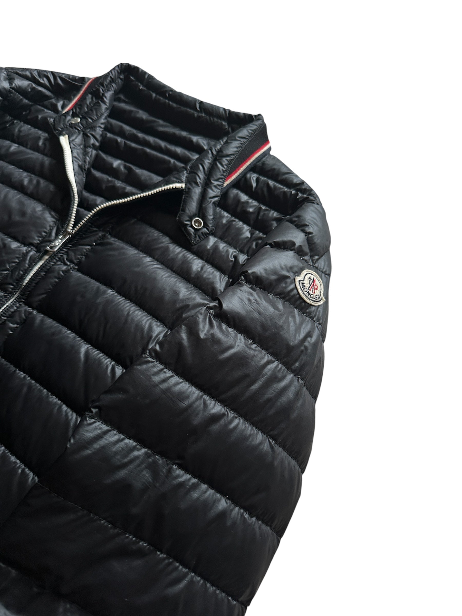 Moncler down jacket pocket detail — FashnLuxe