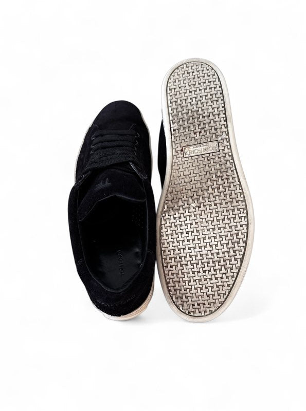 Tom Ford suede sneaker heel detail — FashnLuxe