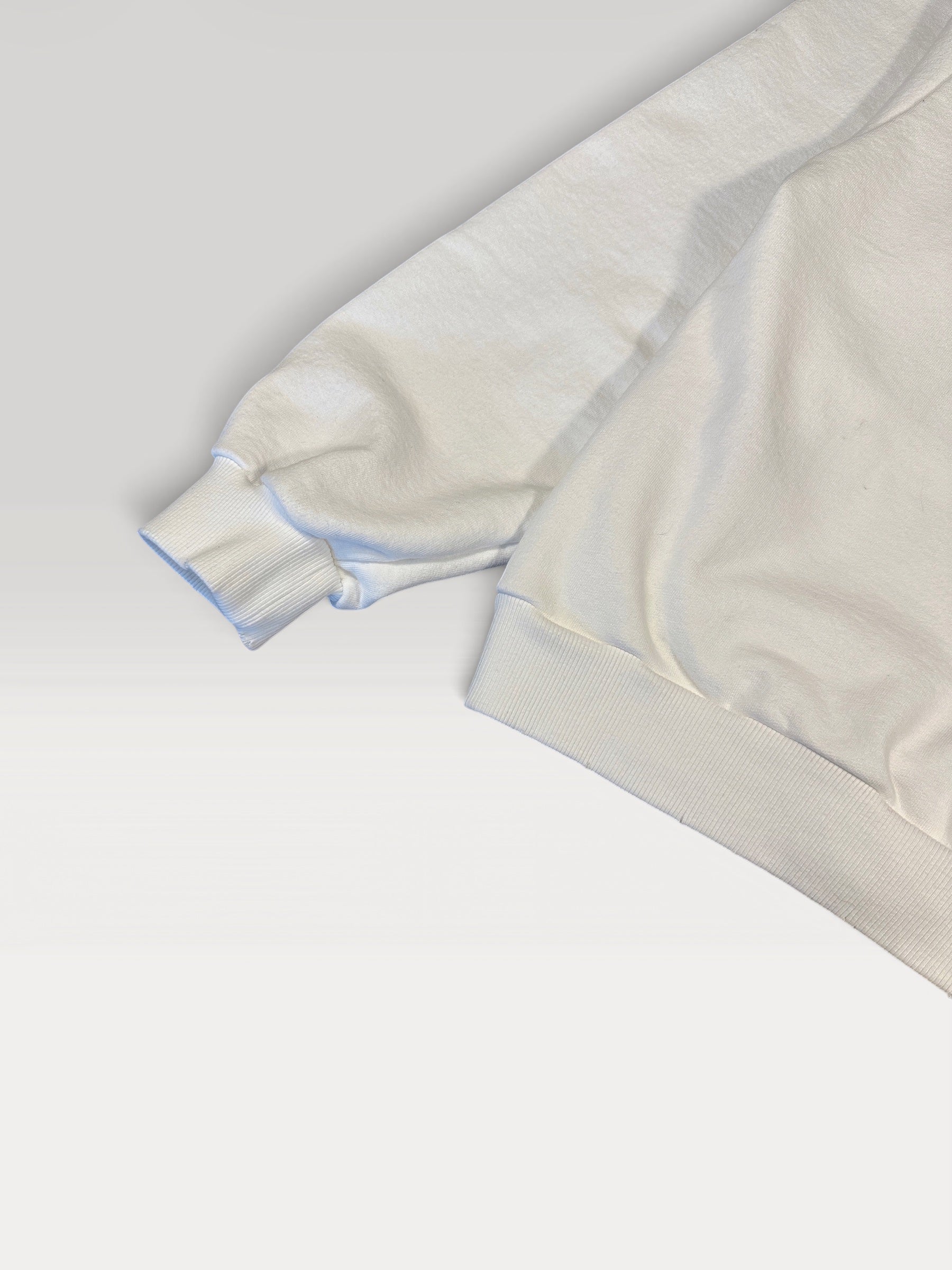 Ribbed cuff and hem detail on the off-white Acne Studios 1996 hoodie