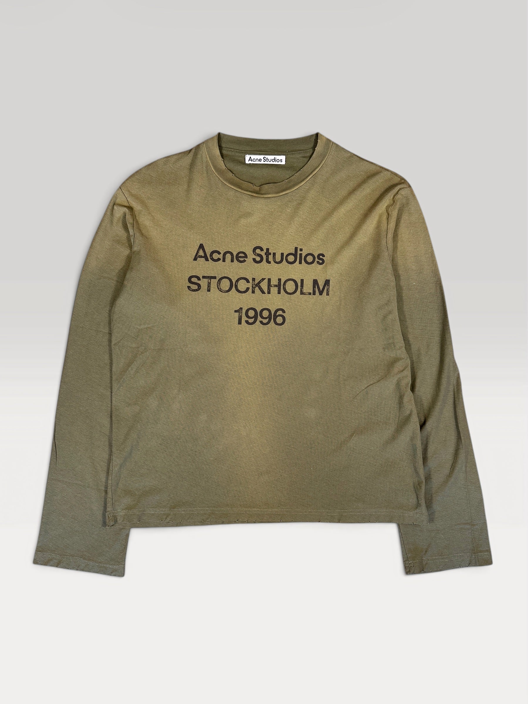 Acne Studios 1996 longsleeve in faded olive, front view with chest logo print