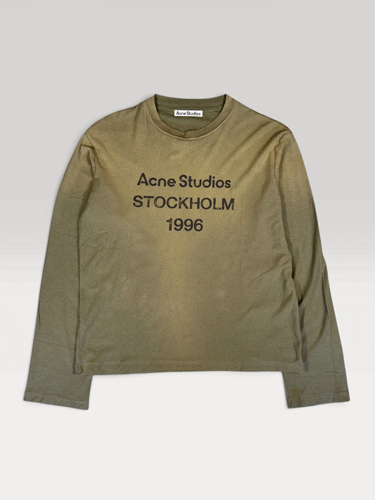 Acne Studios 1996 longsleeve in faded olive, front view with chest logo print